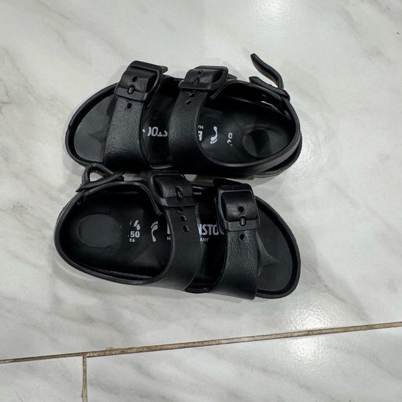 Birkenstock Black Sandals with Adjustable Straps and Contoured Footbed - Picture 1 of 3
